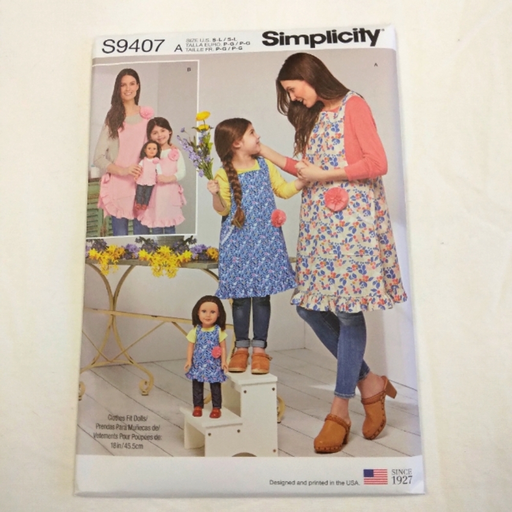 Simplicity S9407 Cute Aprons in adult child & American Girl Doll sizes.